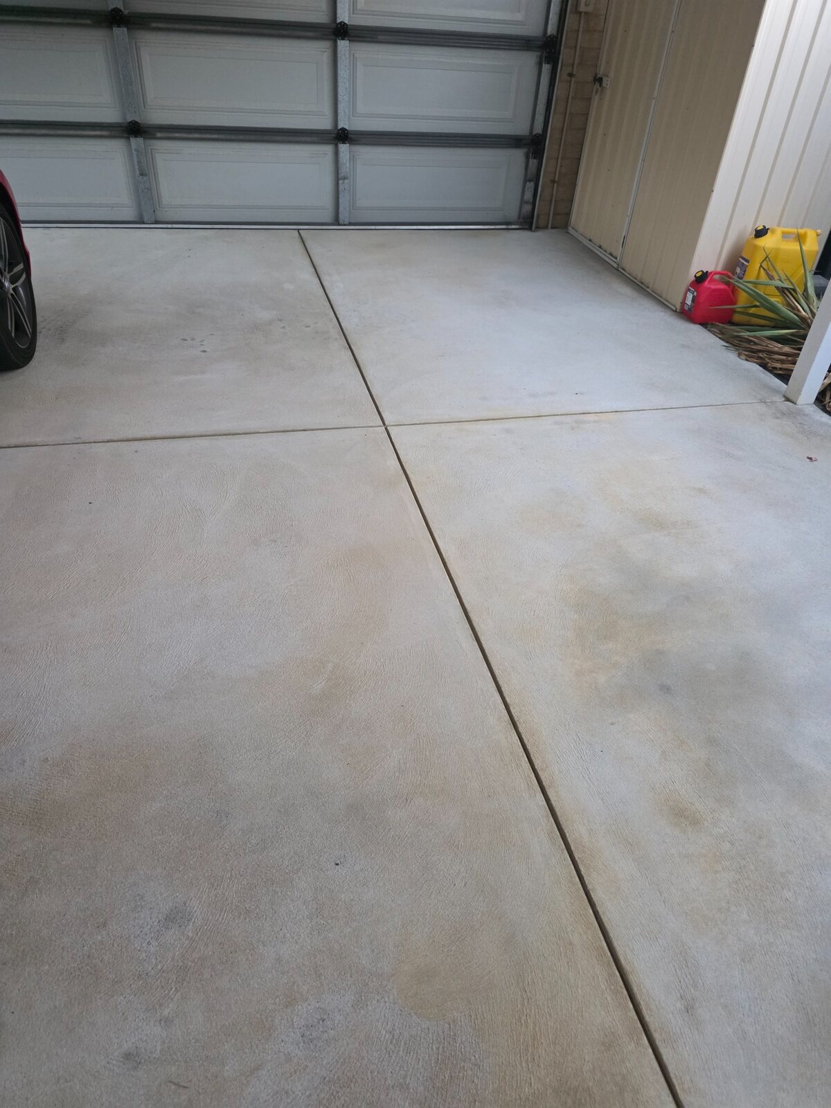 Garage concrete floor after cleaning and stain treatment